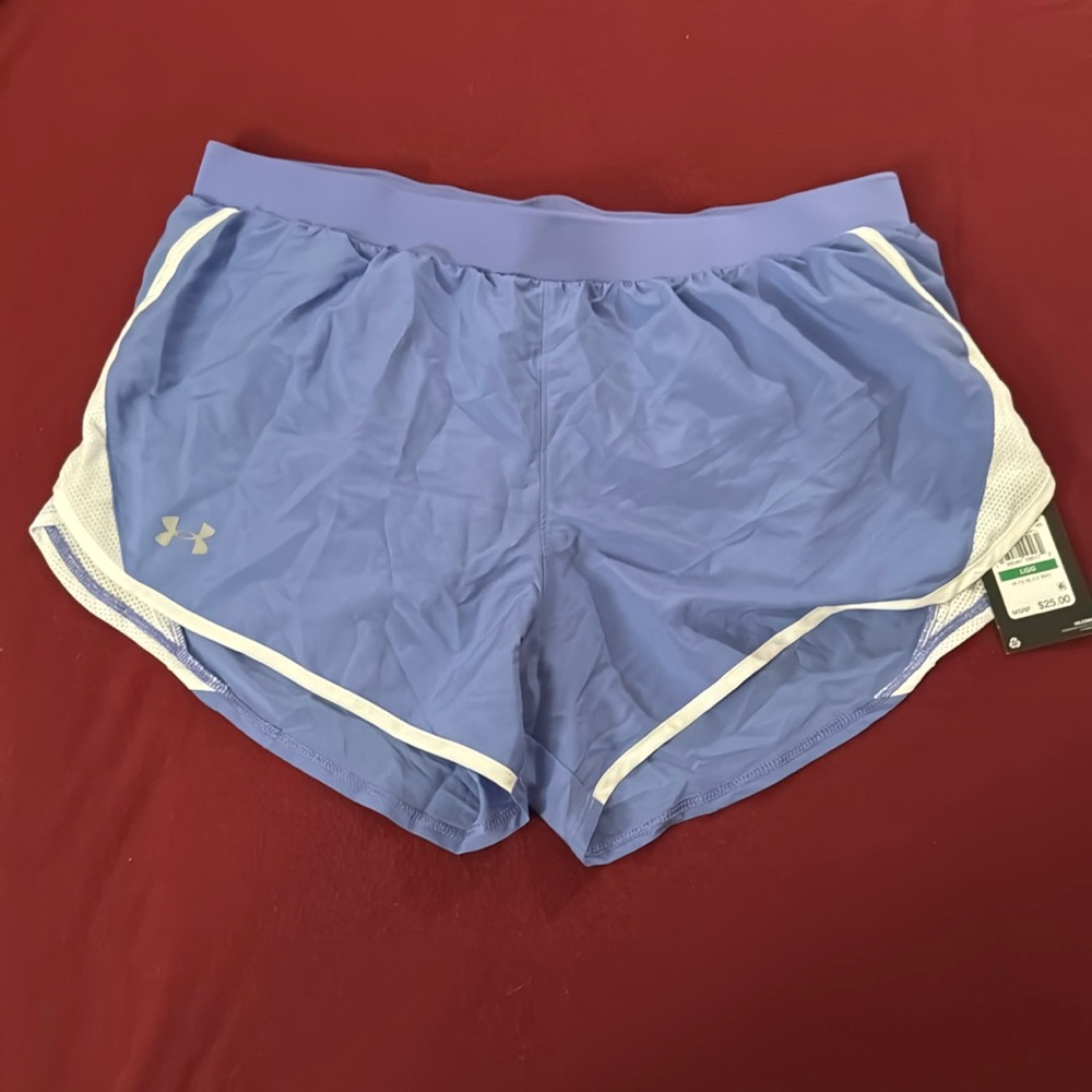 Brand New Women’s Under Armour purple running shorts size large